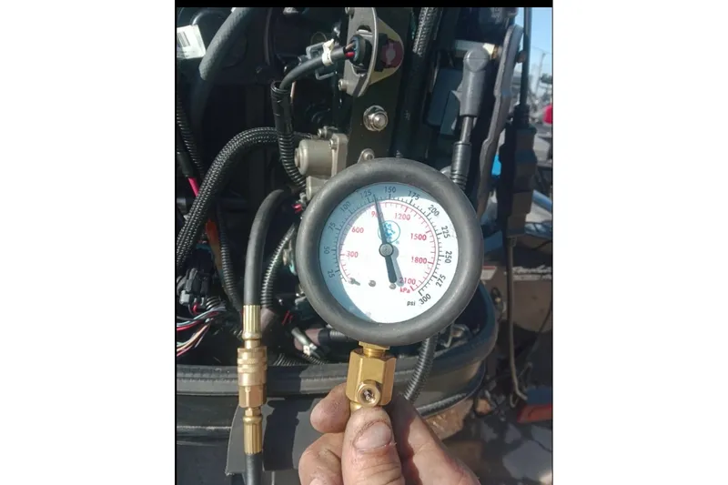 Slide: The Image of 2014 Bass Tracker PRO TEAM 175 TXW boat on trailer by a lake at sunset. - 19