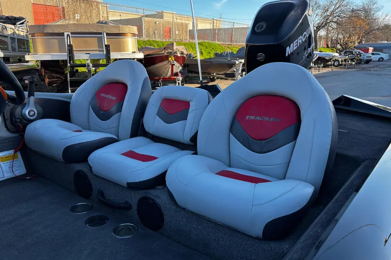 Slide: The Image of 2014 Bass Tracker PRO TEAM 175 TXW with Minn Kota Edge motor at sunset by the lake. - 21