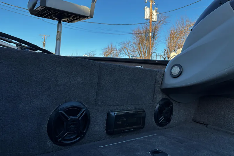 Slide: The Image of Open storage compartment on 2014 Bass Tracker PRO TEAM 175 TXW boat. - 28