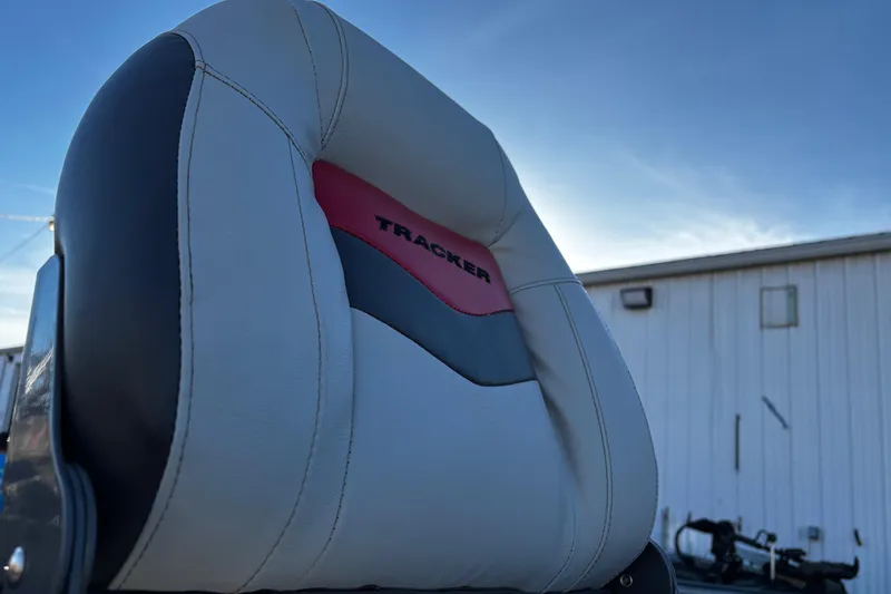 Slide: The Image of 2014 Bass Tracker PRO TEAM 175 TXW boat interior with steering console and seats. - 33