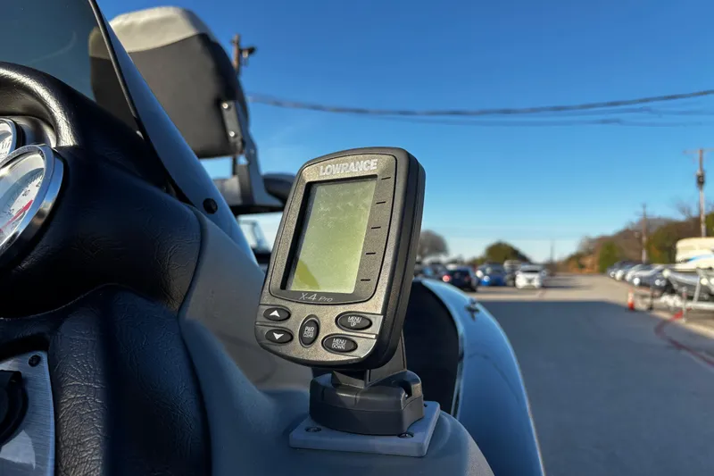 Slide: The Image of 2014 Bass Tracker PRO TEAM 175 TXW boat interior with fire extinguisher under seat. - 35