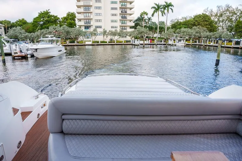 Slide: The Image of Luxurious 2013 Sunseeker Portafino yacht interior with elegant seating and modern design. - 15