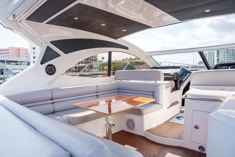 Slide: The Image of Luxurious 2013 Sunseeker Portafino yacht interior with elegant seating and modern design. - 17