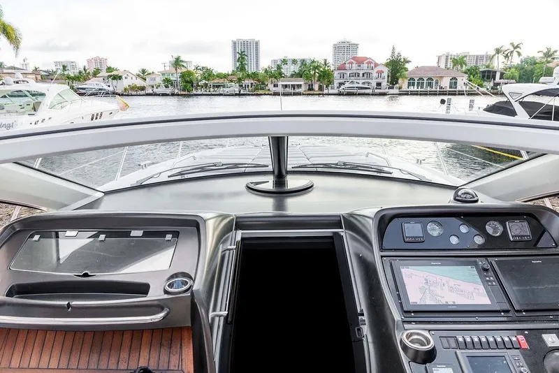 Slide: The Image of Luxurious interior of a 2013 Sunseeker Portafino yacht with modern seating and amenities. - 24