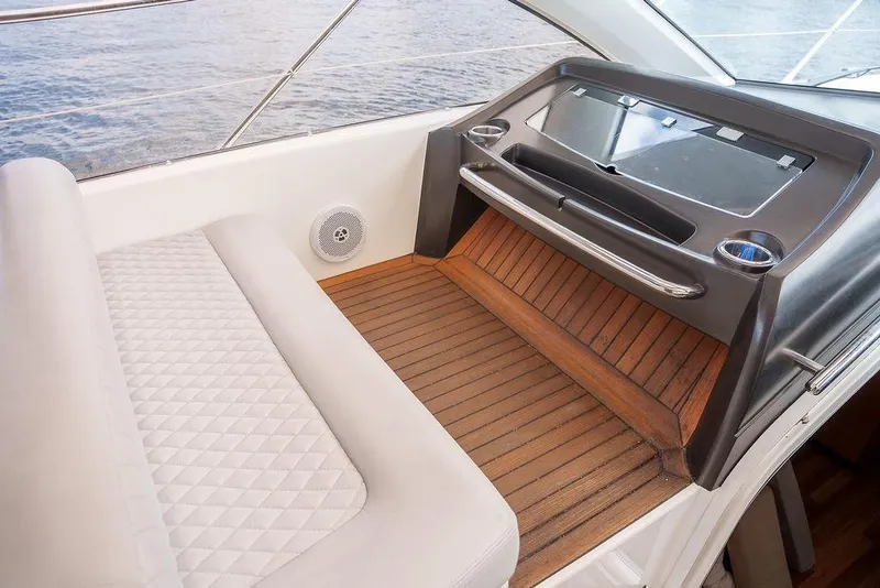 Slide: The Image of Interior of 2013 Sunseeker Portafino yacht with luxurious seating and panoramic windows. - 37