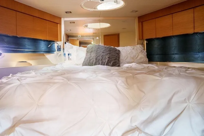 Slide: The Image of Interior of 2013 Sunseeker Portafino yacht with modern kitchen and cozy bedroom. - 52