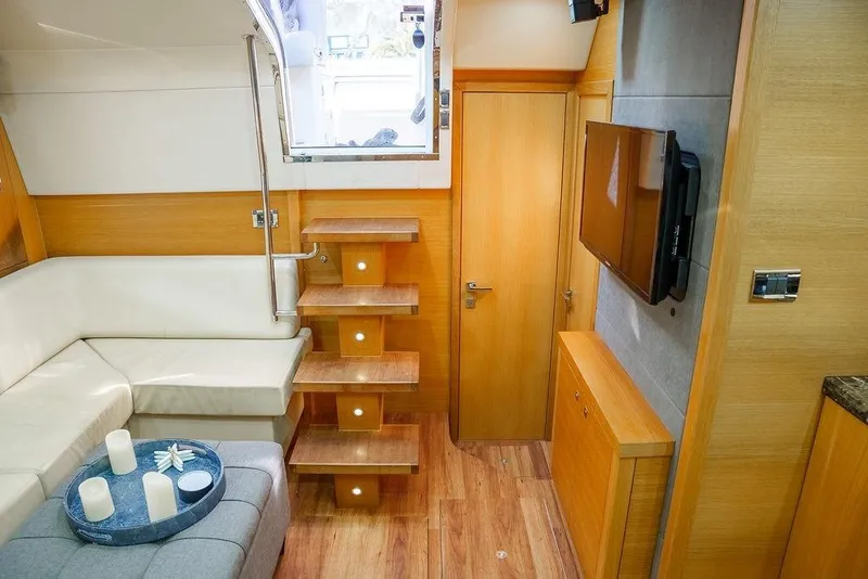 Slide: The Image of Luxurious bathroom in 2013 Sunseeker Portafino yacht with modern fixtures and marble countertop. - 56