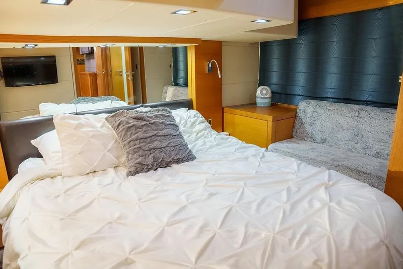 Slide: The Image of Luxurious bedroom interior of 2013 Sunseeker Portafino yacht with modern furnishings. - 60