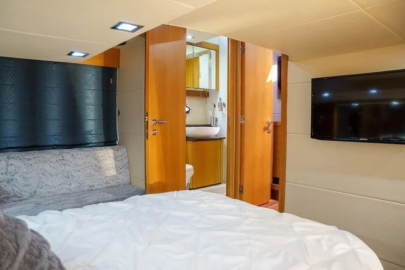 Slide: The Image of Luxurious interior of 2013 Sunseeker Portafino yacht with cream seating and decorative accents. - 67