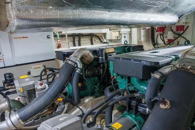 Slide: The Image of Engine room of 2013 Sunseeker Portafino yacht with Cummins Onan generator. - 71