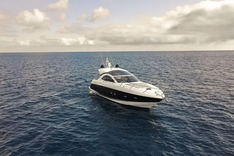 Slide: The Image of 2013 Sunseeker Portafino yacht on open sea. - 8