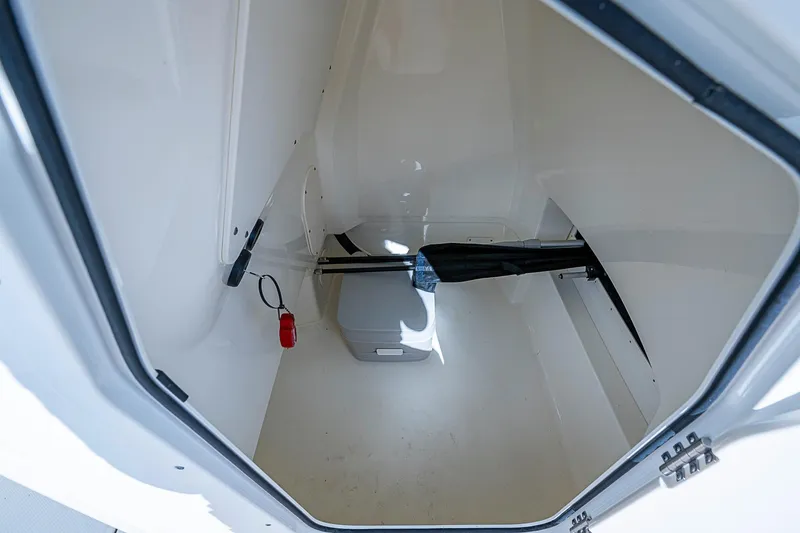 Slide: The Image of Interior storage compartment of 2023 Boston Whaler 250 Dauntless boat. - 8