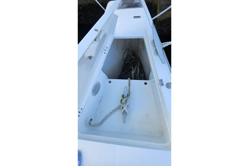 Slide: The Image of Beneteau First 36.7 sailboat anchor locker with ropes, 2004 model. - 14