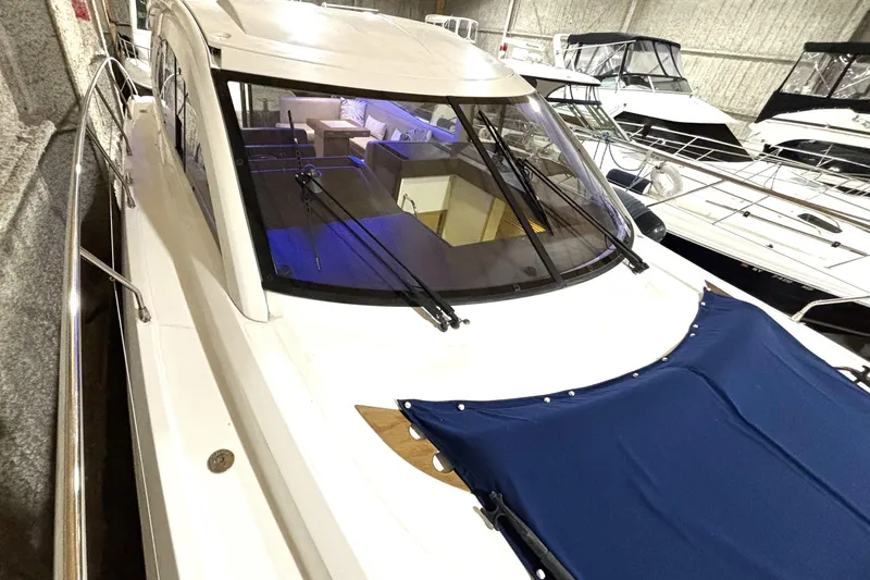 Slide: The Image of 2015 Beneteau Gran Turismo 49 yacht in storage, showcasing sleek design and spacious interior. - 26