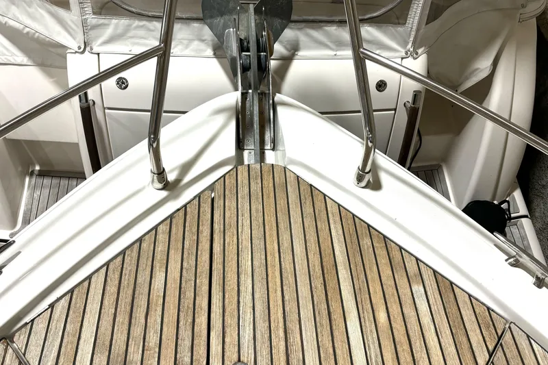 Slide: The Image of Bow view of 2015 Beneteau Gran Turismo 49 with teak decking and stainless steel railings. - 28
