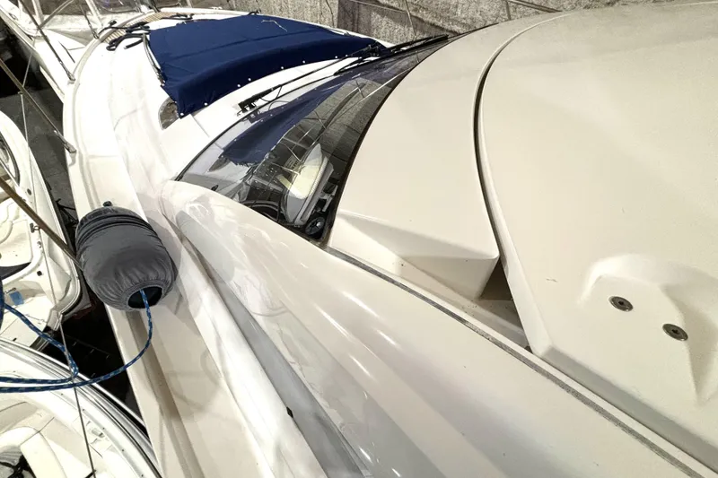 Slide: The Image of 2015 Beneteau Gran Turismo 49 yacht, sleek design, docked with blue cover. - 29