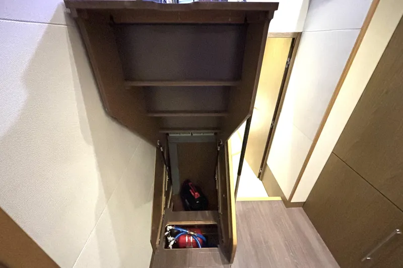 Slide: The Image of Interior view of 2015 Beneteau Gran Turismo 49 yacht, featuring a storage compartment. - 37