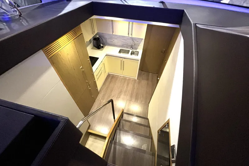 Slide: The Image of Interior view of 2015 Beneteau Gran Turismo 49 yacht kitchen area. - 53