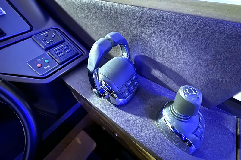 Slide: The Image of Control panel of 2015 Beneteau Gran Turismo 49 yacht with joystick and throttle. - 54