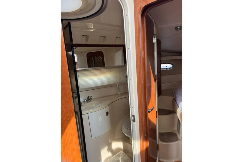 Slide: The Image of 2005 Regal Commodore 3880 yacht interior with bathroom and cabin view. - 20