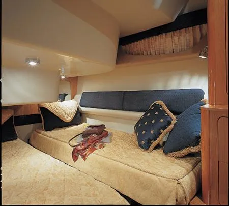 Slide: The Image of Interior view of 2005 Regal Commodore 3880 boat with seating and windows. - 5