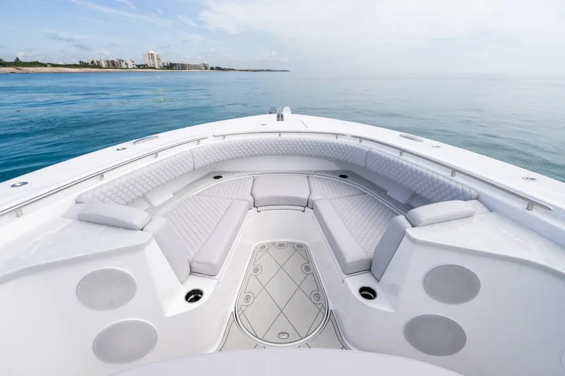 Slide: The Image of Luxurious seating area on the 2025 HCB 56 Suenos GIX yacht, with ocean view. - 11
