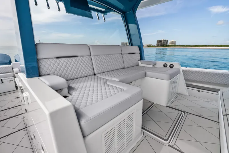 Slide: The Image of Luxurious seating on the 2025 HCB 56 Suenos GIX yacht, with ocean view. - 28