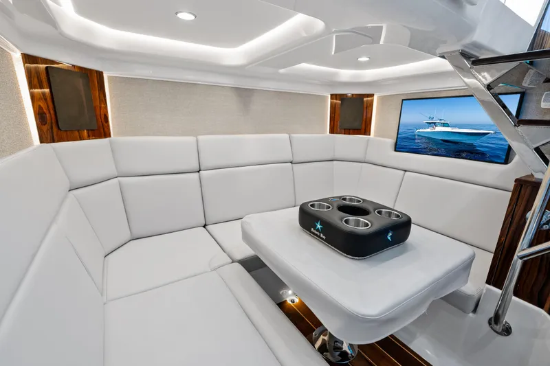 Slide: The Image of Luxurious interior of 2025 HCB 56 Suenos GIX yacht with plush seating and modern decor. - 30