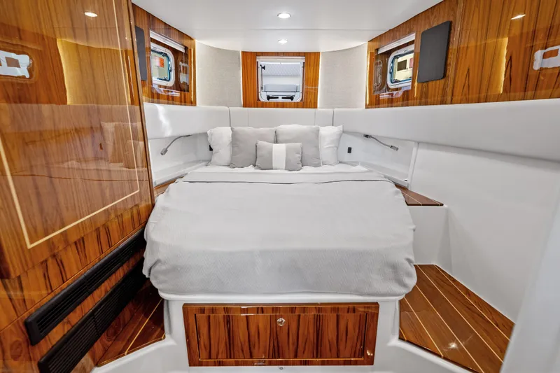 Slide: The Image of Luxurious cabin interior of 2025 HCB 56 Suenos GIX with elegant wood finish. - 32