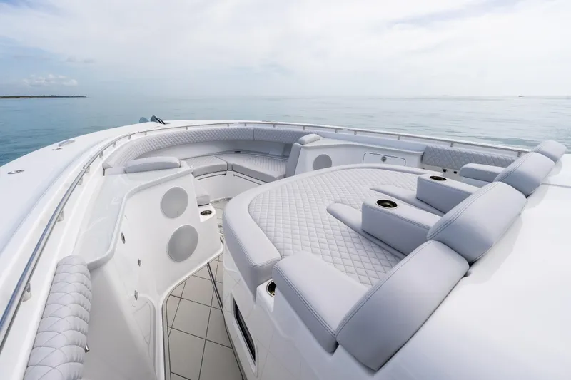 Slide: The Image of Luxurious seating area on the 2025 HCB 56 Suenos GIX yacht, featuring elegant design. - 4