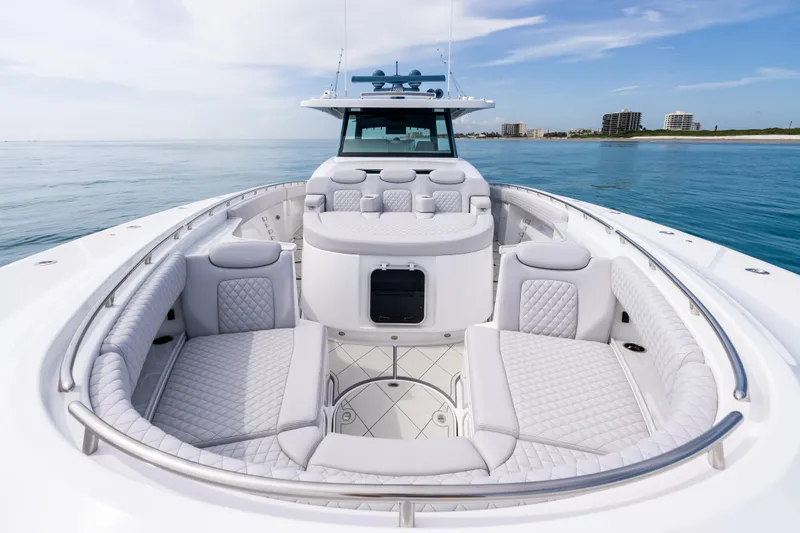 Slide: The Image of Luxurious 2025 HCB 56 Suenos GIX yacht with elegant seating and ocean view. - 48