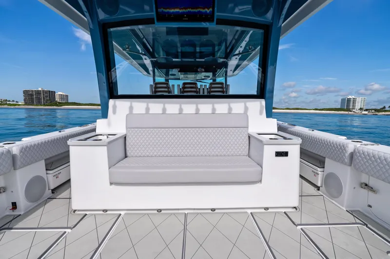 Slide: The Image of 2025 HCB 56 Suenos GIX luxury boat interior with seating, ocean view. - 52