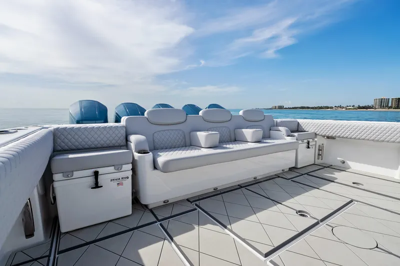 Slide: The Image of Luxurious seating on the 2025 HCB 56 Suenos GIX yacht, with ocean view. - 38