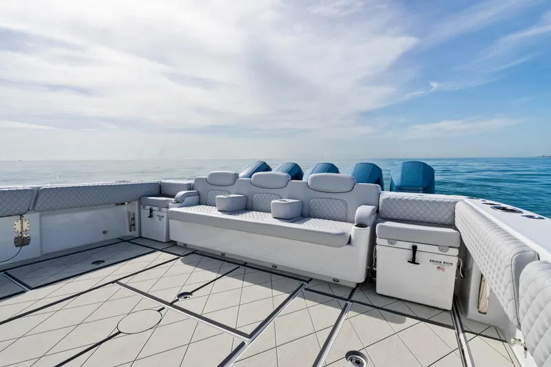 Slide: The Image of Luxurious 2025 HCB 56 Suenos GIX yacht with spacious seating and ocean view. - 42