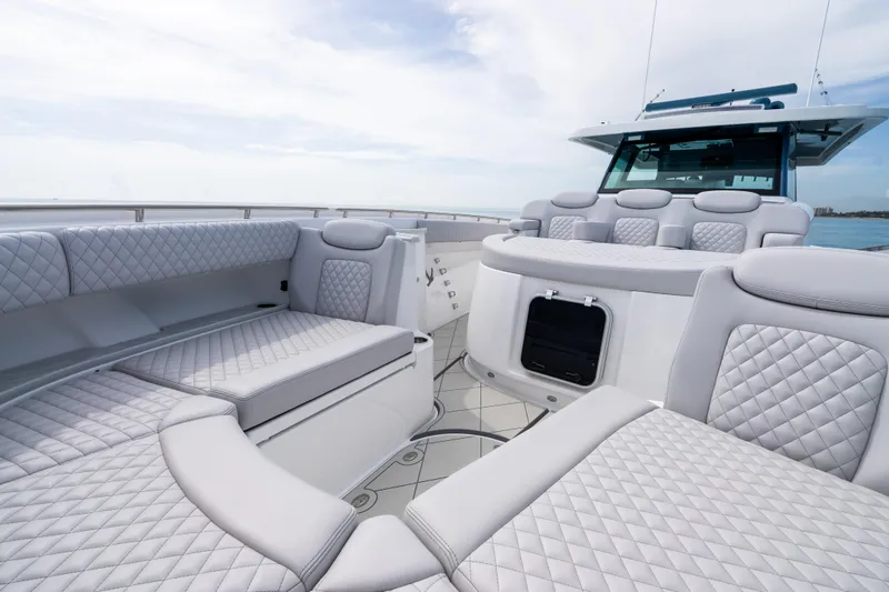 Slide: The Image of Luxurious seating on 2025 HCB 56 Suenos GIX yacht with quilted upholstery. - 54