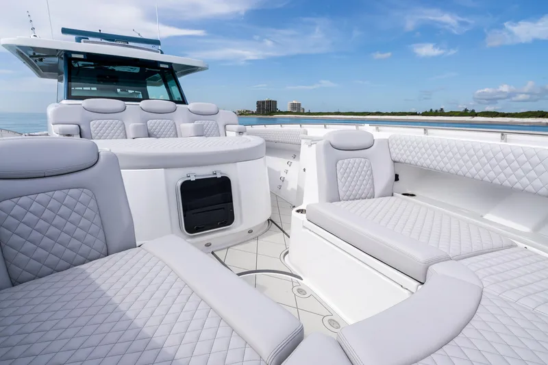 Slide: The Image of Luxurious seating on 2025 HCB 56 Suenos GIX yacht, featuring elegant white upholstery. - 58