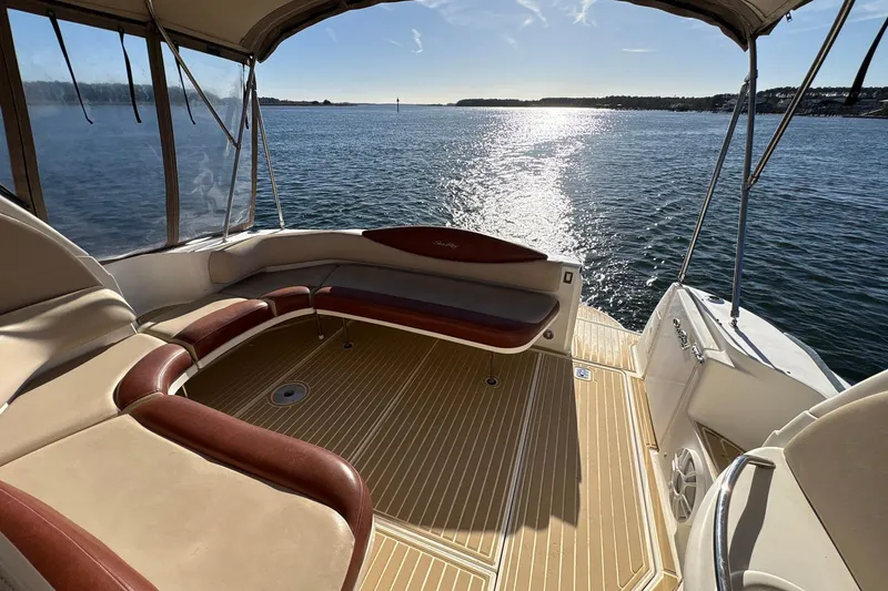Slide: The Image of 1999 Sea Ray 380 Sundancer boat interior with scenic ocean view. - 10