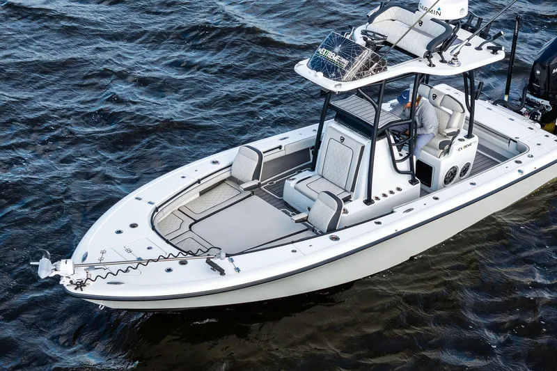 Slide: The Image of 2021 Barker Boatworks 26 Open on water, showcasing sleek design and modern features. - 12