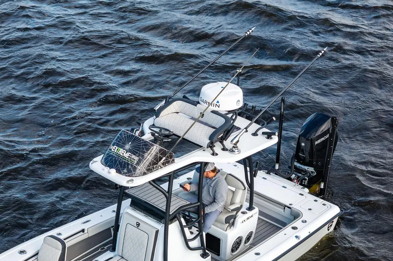 Slide: The Image of 2021 Barker Boatworks 26 Open on water, equipped with Garmin technology. - 14