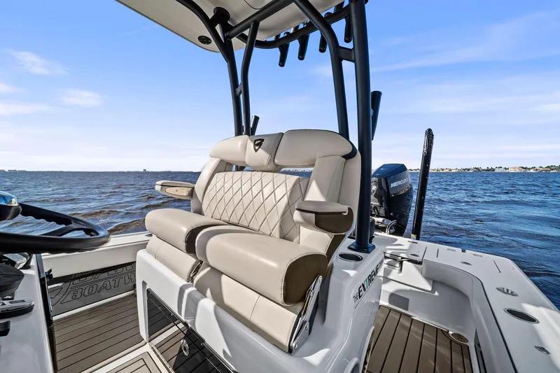 Slide: The Image of 2021 Barker Boatworks 26 Open with luxurious seating on open water. - 32