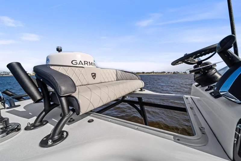 Slide: The Image of 2021 Barker Boatworks 26 Open helm with Garmin equipment on a sunny day. - 33