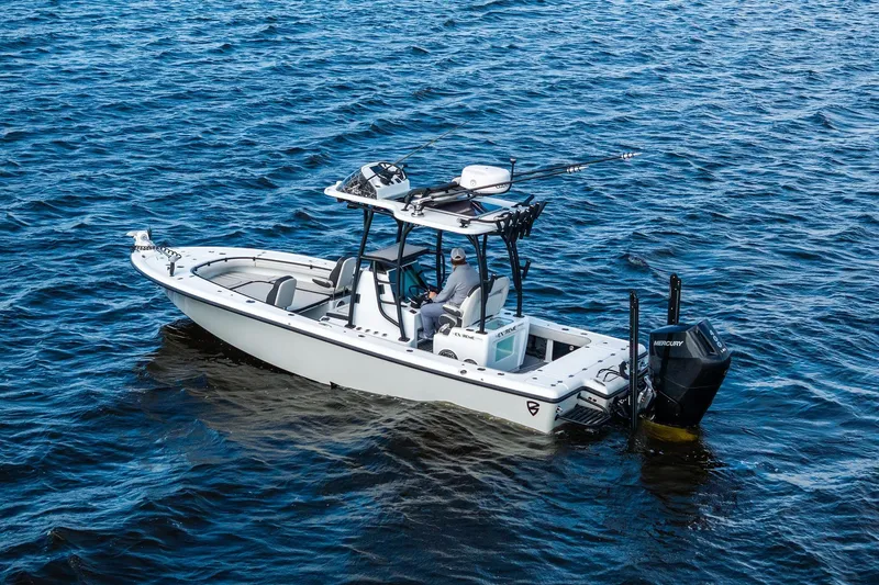 Slide: The Image of 2021 Barker Boatworks 26 Open on water, featuring sleek design and powerful engine. - 5