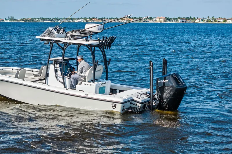 Slide: The Image of 2021 Barker Boatworks 26 Open on water, equipped with Mercury engine. - 7