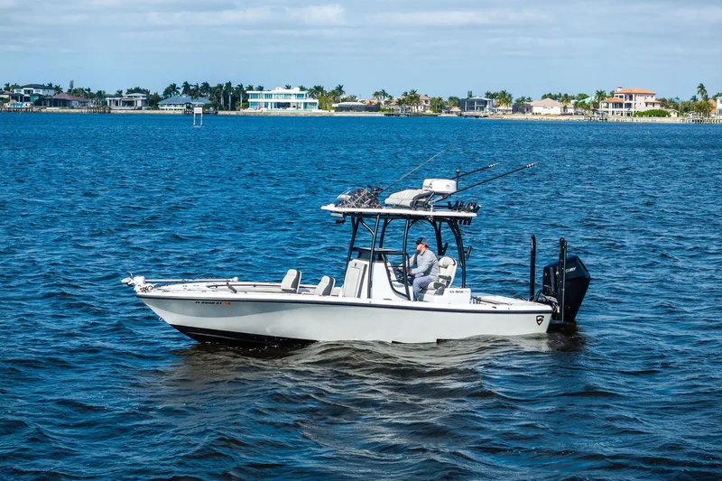 Slide: The Image of 2021 Barker Boatworks 26 Open cruising on a sunny day in coastal waters. - 9