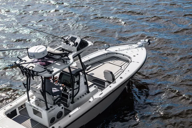 Slide: The Image of 2021 Barker Boatworks 26 Open on water, featuring advanced navigation equipment. - 10