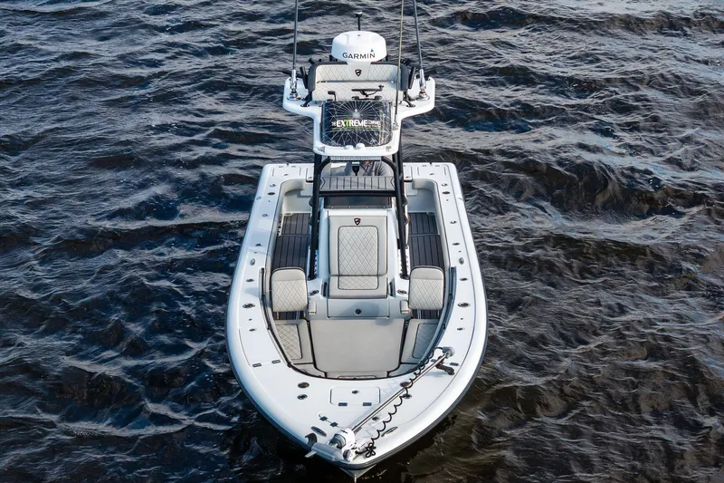 Slide: The Image of 2021 Barker Boatworks 26 Open on water, aerial view, featuring Garmin equipment. - 11