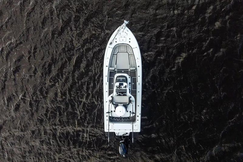 Slide: The Image of Aerial view of 2021 Barker Boatworks 26 Open on dark water. - 19