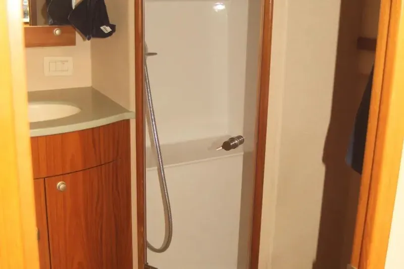 Slide: The Image of 2012 Custom Carolina 60 Sportfish 115 - 115