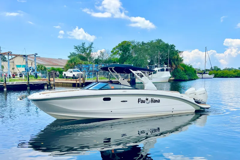 Slide: The Image of 2019 Sea Ray SDX 290 Outboard boat with luxurious tan seating and elegant interior design. - 20