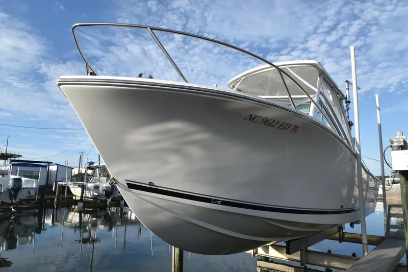 The Image of 2017 Albemarle 25 Express boat docked under clear sky. - 0